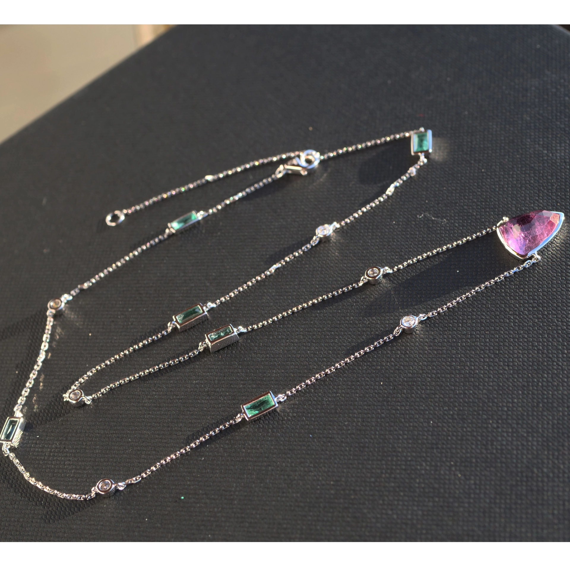 Modern Dream Necklace with kolumbian Emeralds and a Rosecut Turmalin