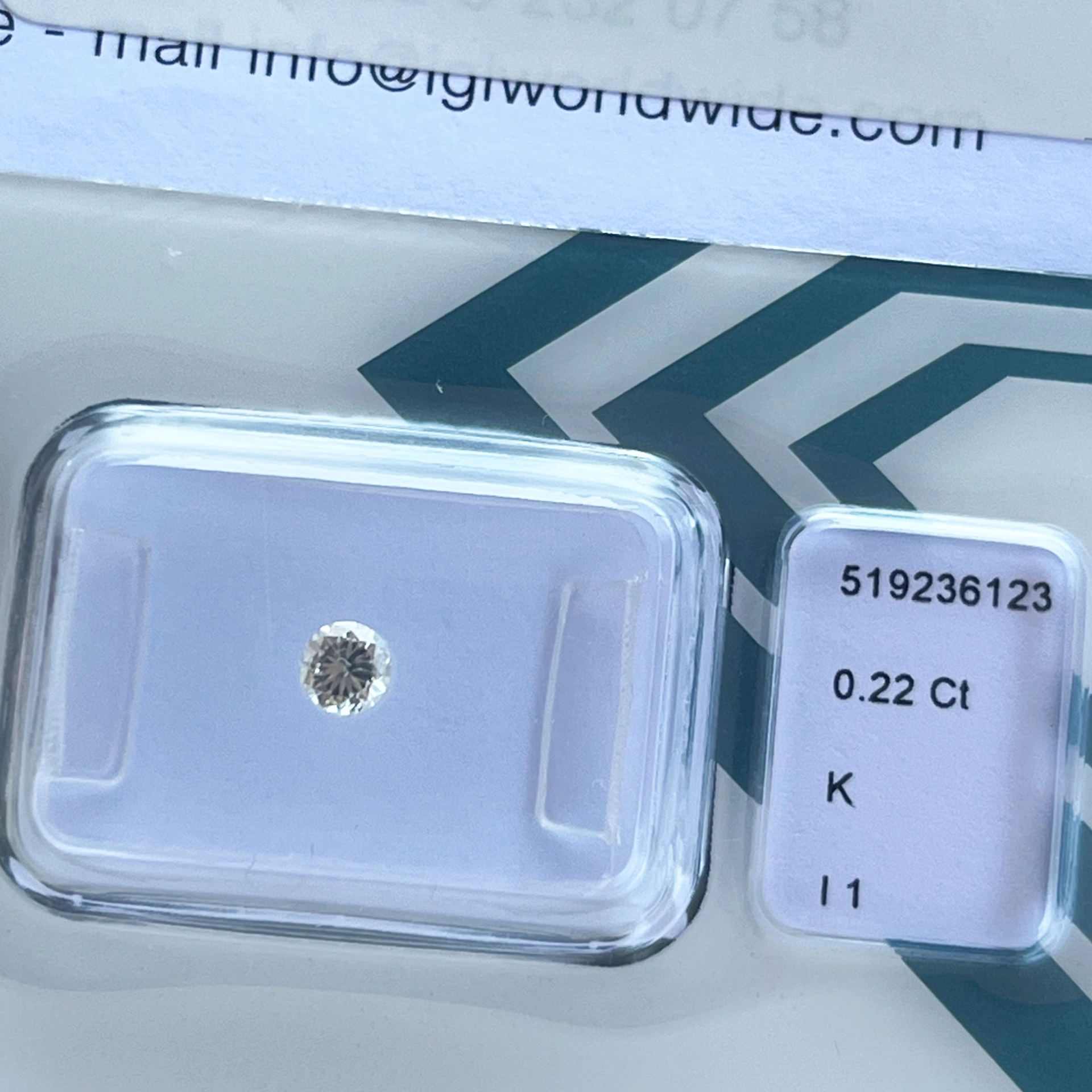 Cool full cut brilliant ideal for framing, 0.22 ct, tinted white (K) / I1  welded by IGI