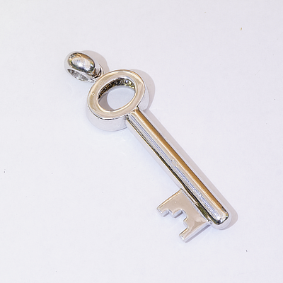 Key Pendant 18 kt solid Whitegold with Brilliants total 1 ct TW IF-VVS....so precious