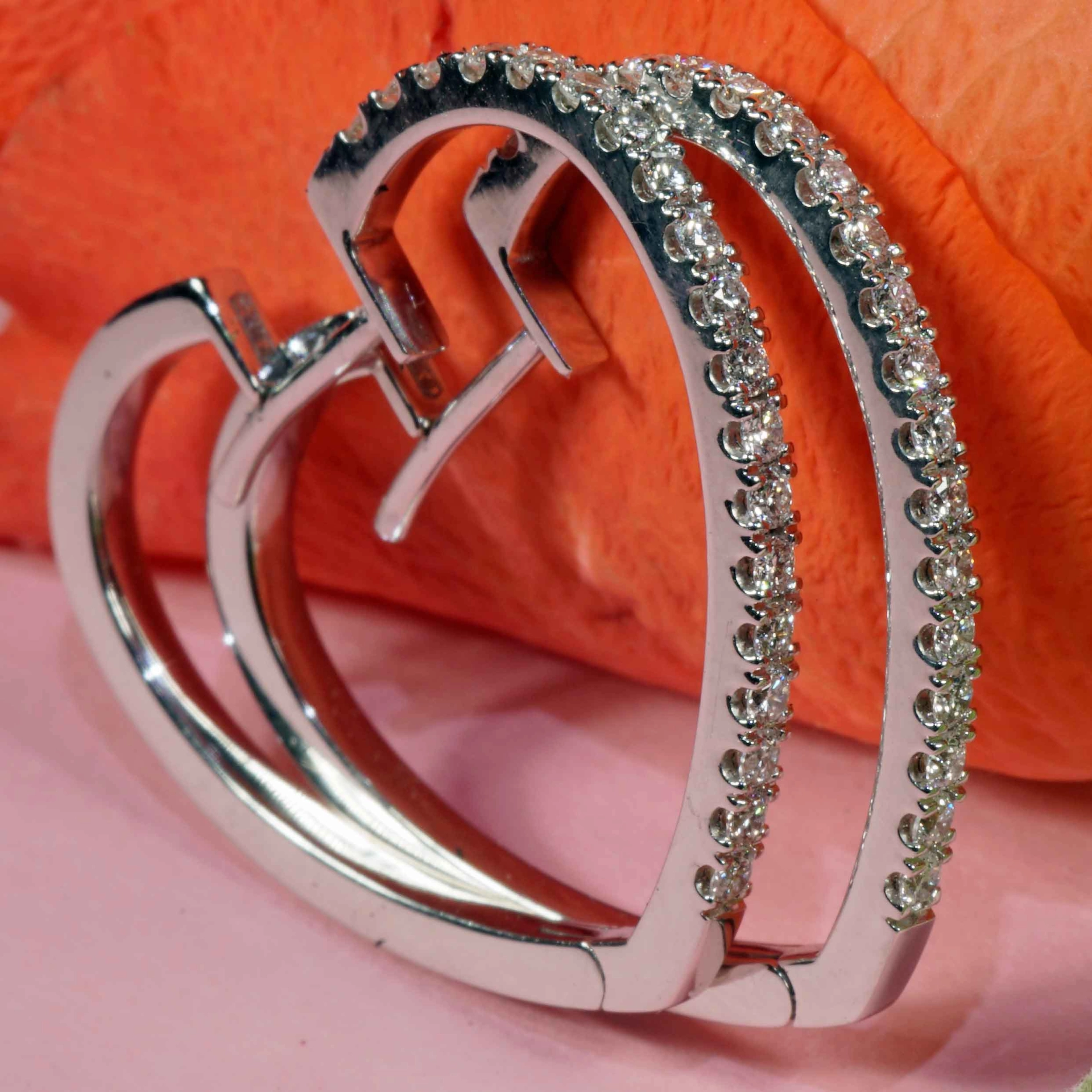 Heartshaped Brilliant Creoles....italian Life Energy for every Day...18 kt Heart Gold