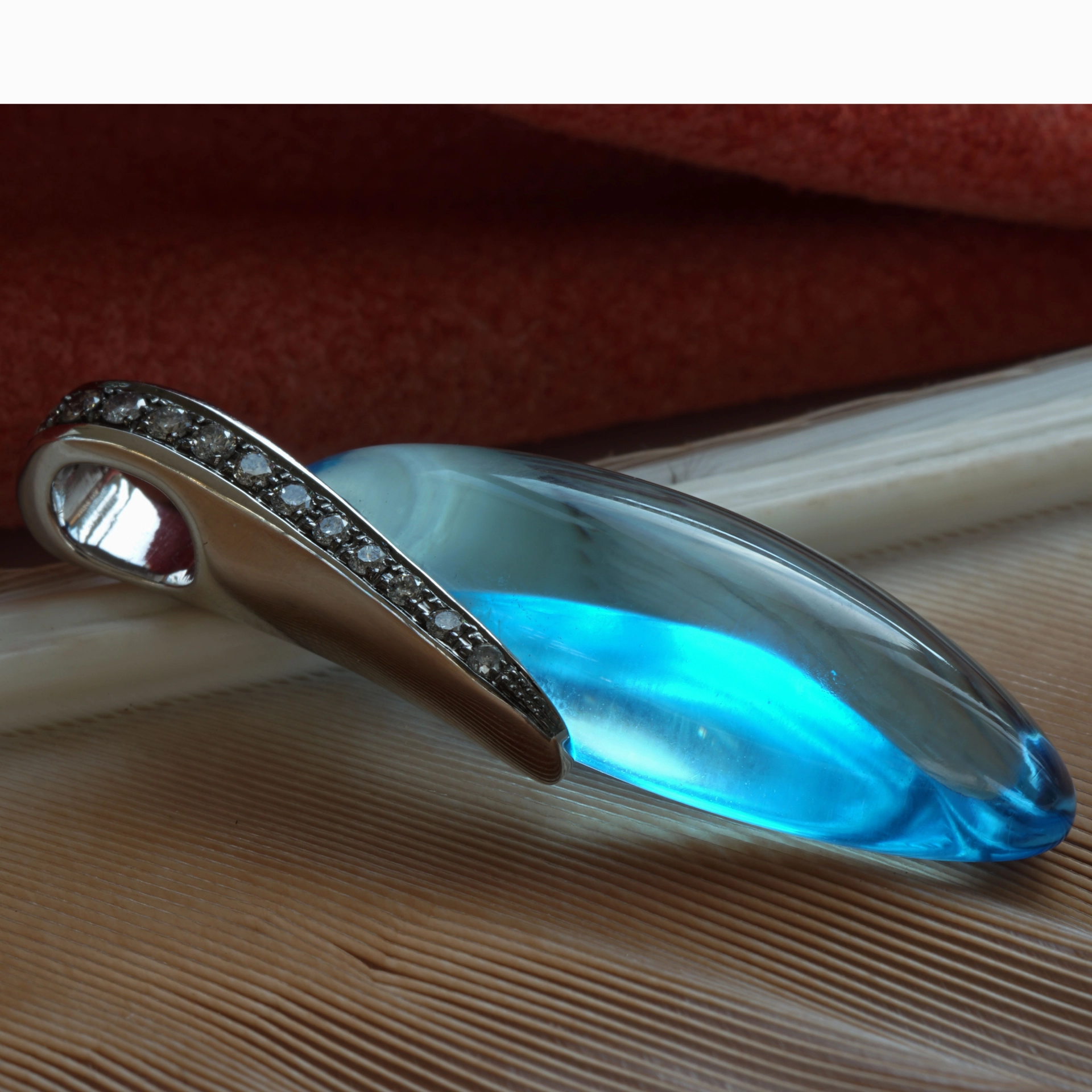 Amazing Color Blue forever a Blue Topas approx. 24 ct modern Setting with Grey Diamonds