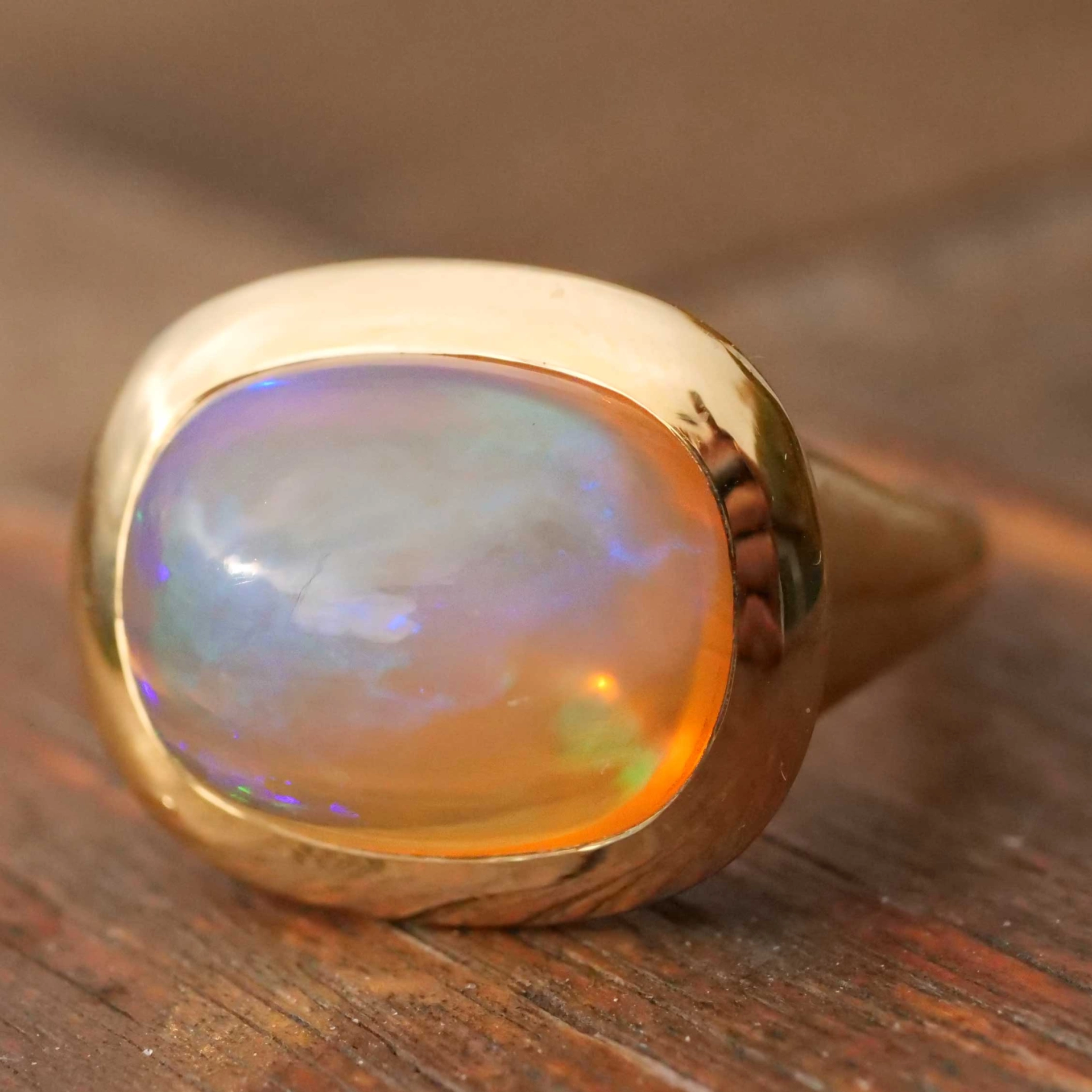 Fire Opal Ring 7 ct modern Cushion Design 18 kt Yellow Gold made in Valenza (Italy)