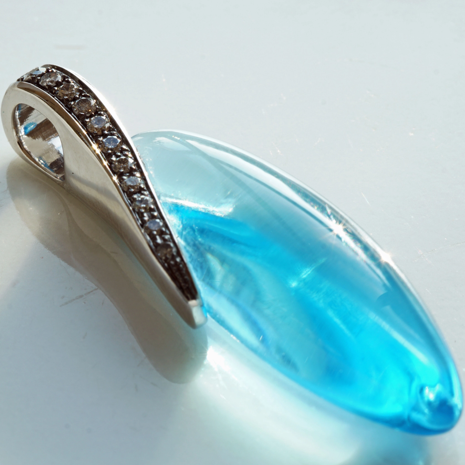 Amazing Color Blue forever a Blue Topas approx. 24 ct modern Setting with Grey Diamonds
