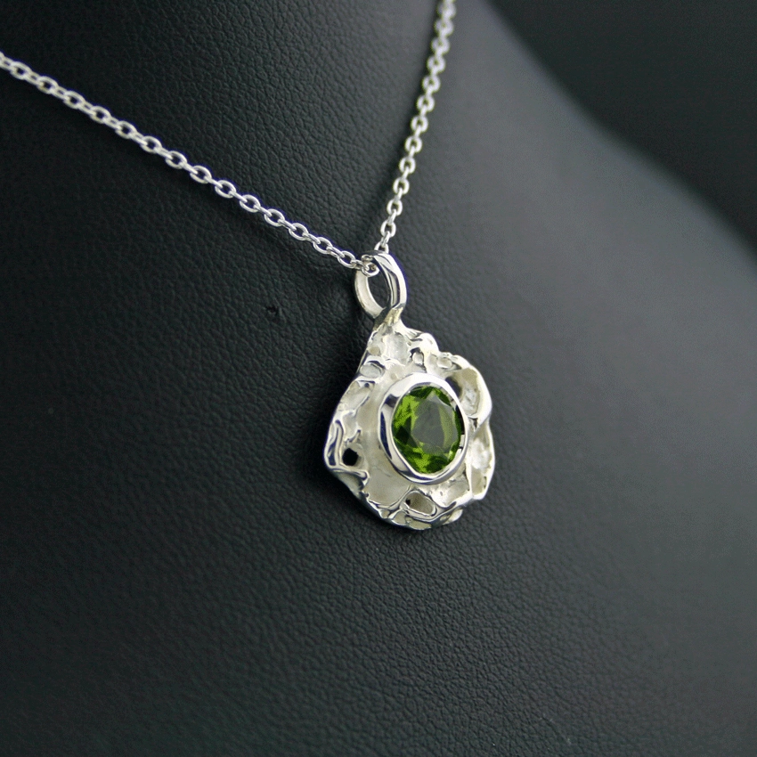 Silberschmiedearbeit, 925/-Silber mit Peridot