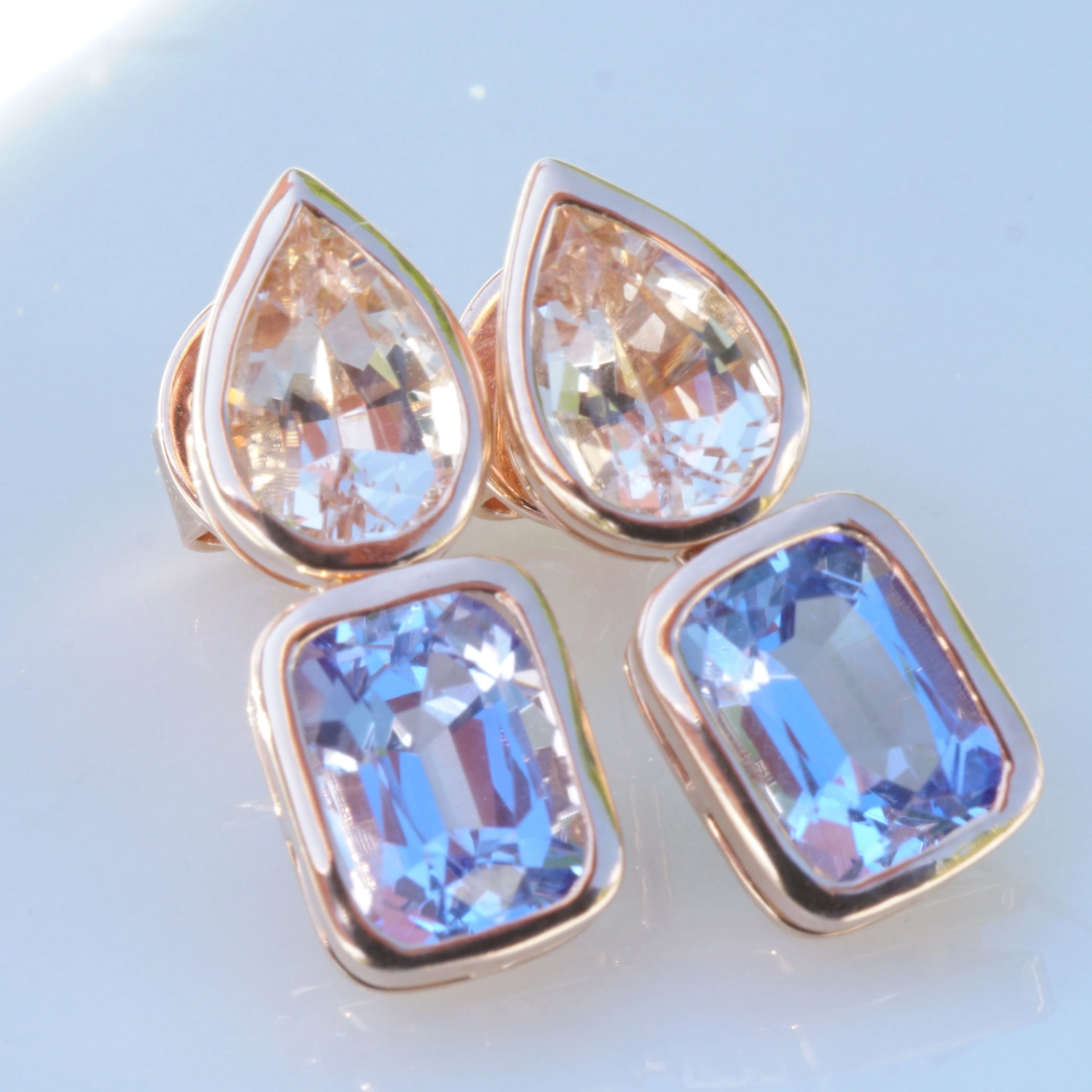 Madagascar meets Tanzania....here we combinated morganite and tansanite, not often seen