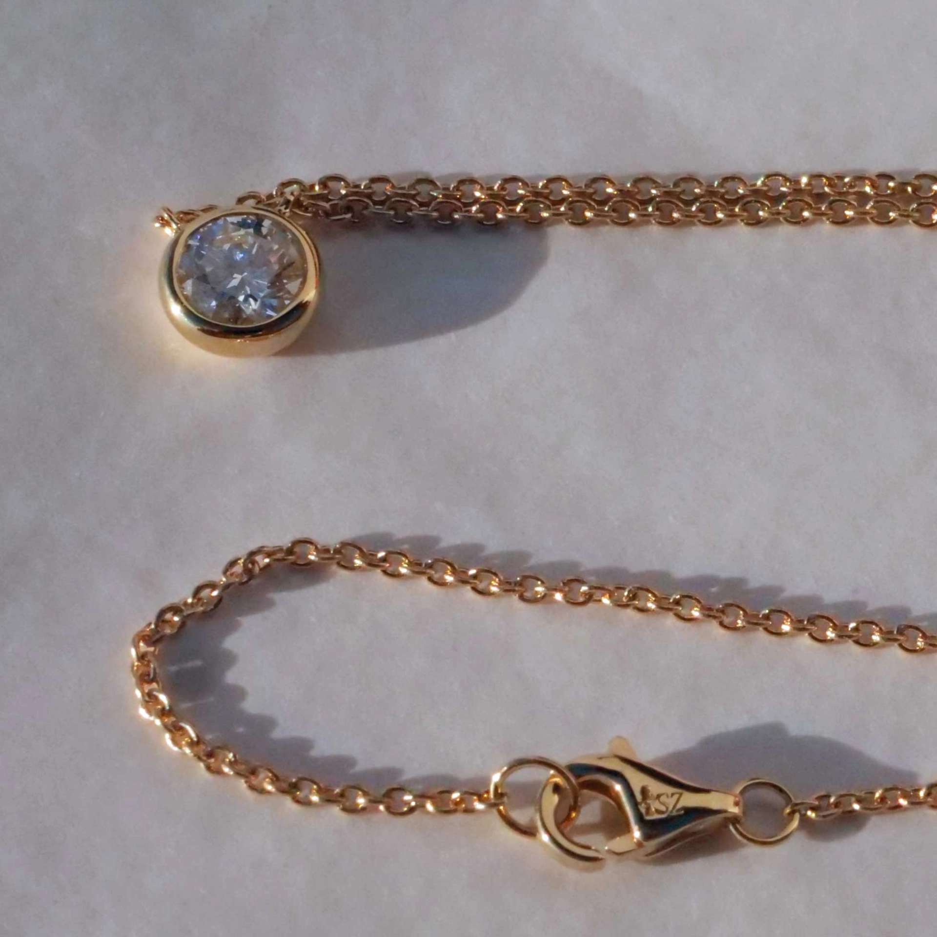 Brilliant Necklace 0.50 ct E (very fine white) / SI1 (small inclusions) with GIA report 18 kt Gold