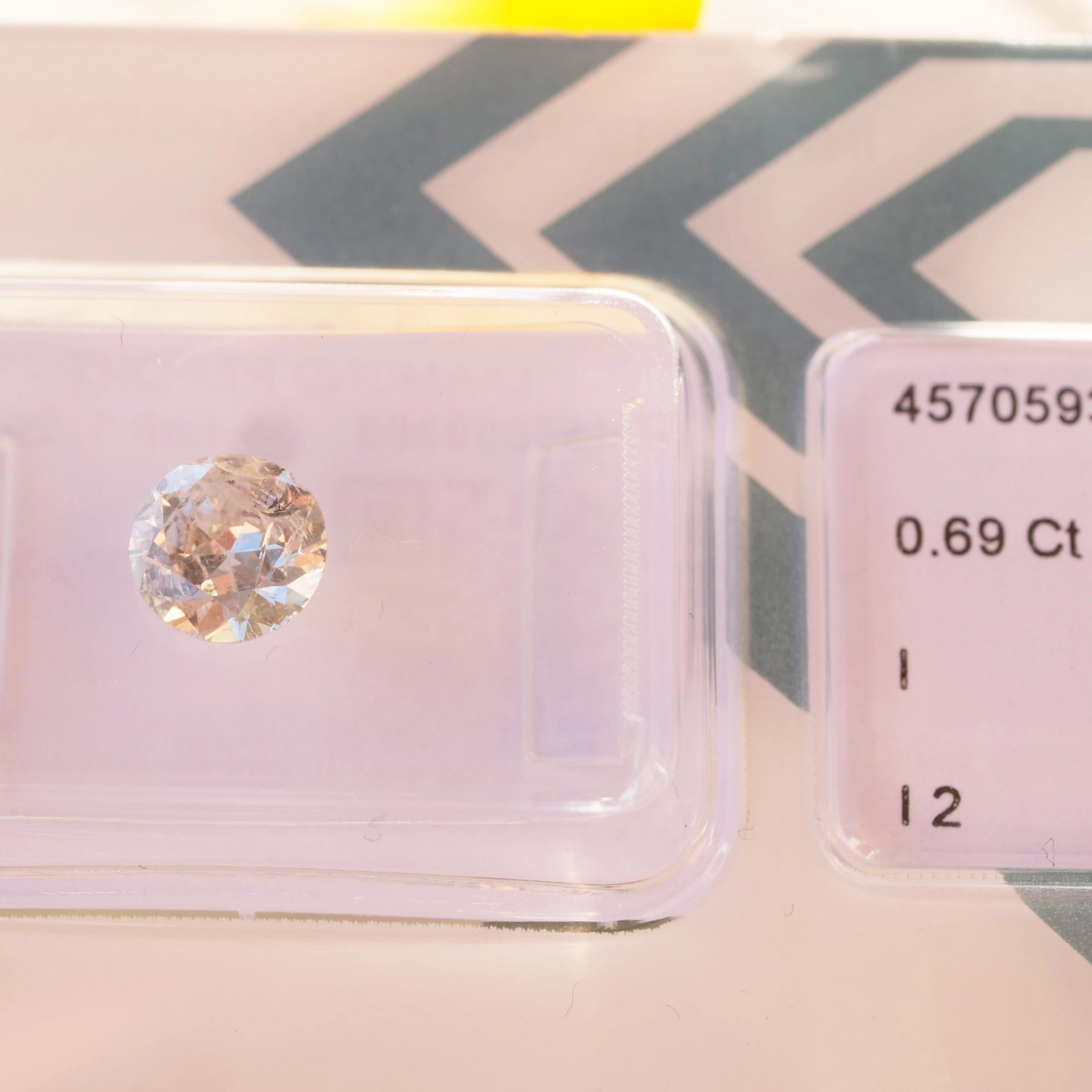 Cool full cut brilliant ideal for framing, 0.22 ct, tinted white (K) / I1  welded by IGI