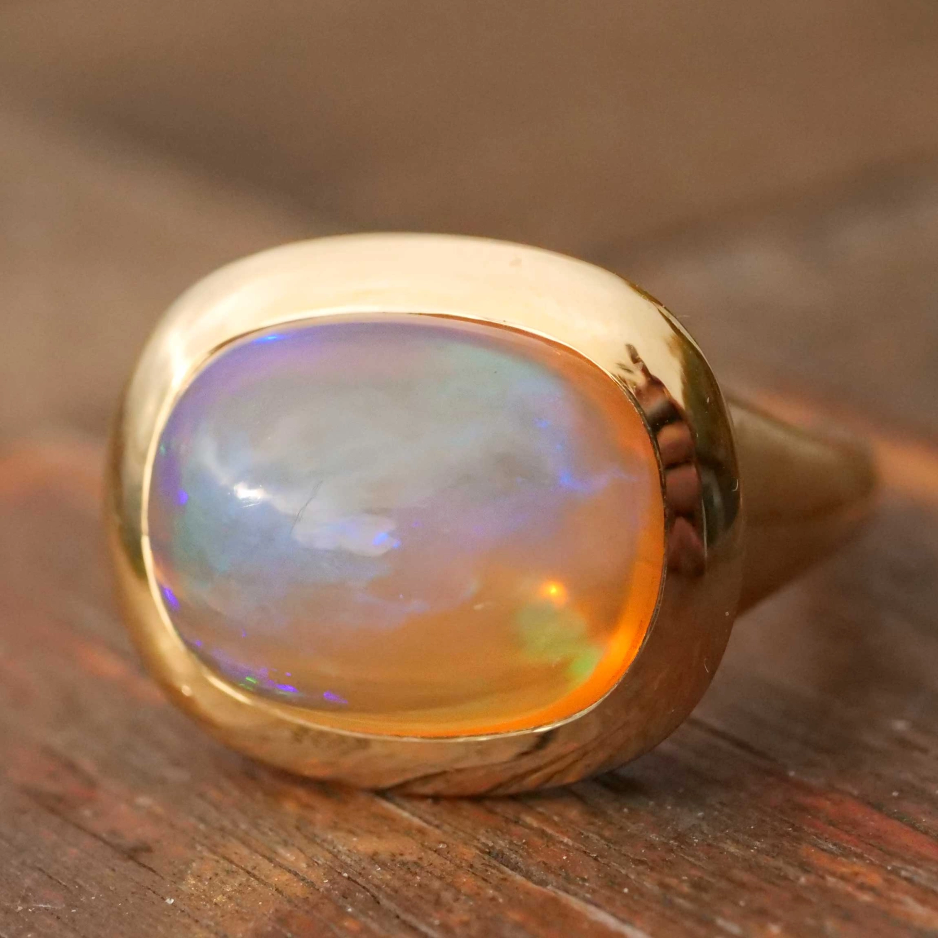 Fire Opal Ring 7 ct modern Cushion Design 18 kt Yellow Gold made in Valenza (Italy)