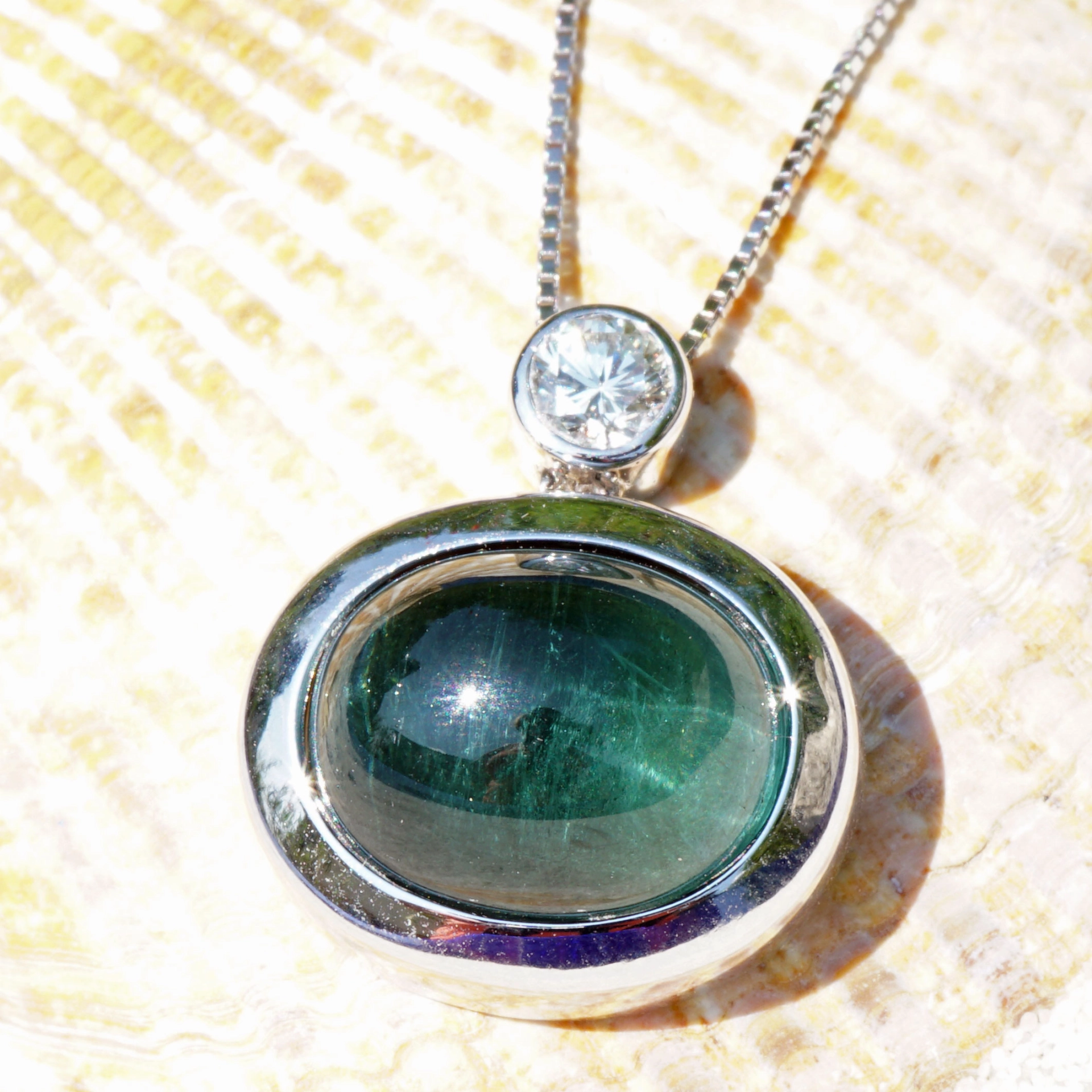 ..big blue turmalin pendant.....very nice color....great appearance, cabochon, approx. 8.35 ct, AAA loupeclean diamond