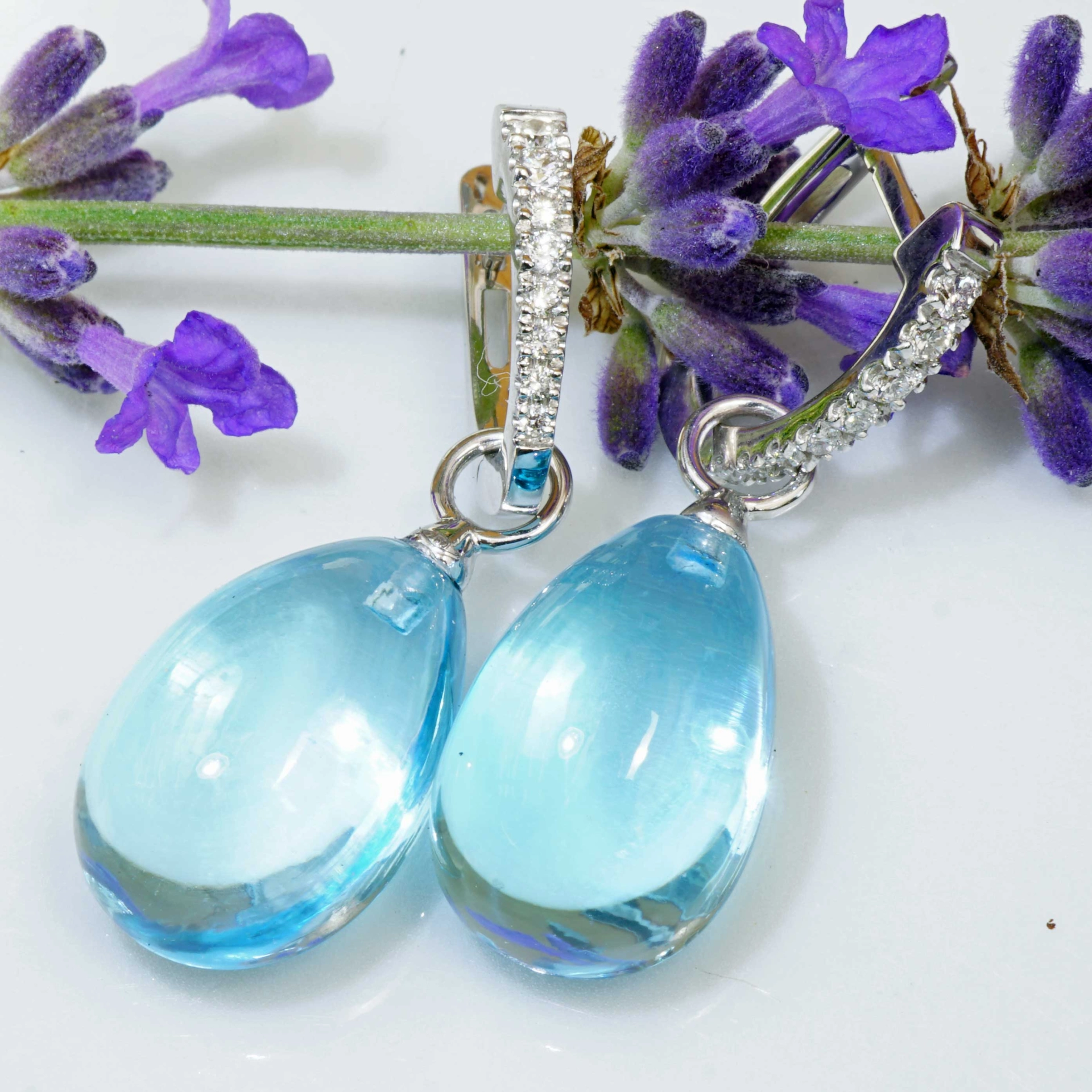 Swiss Blue Color Topaz and Brilliants 18 kt White Gold...a miracle Combination