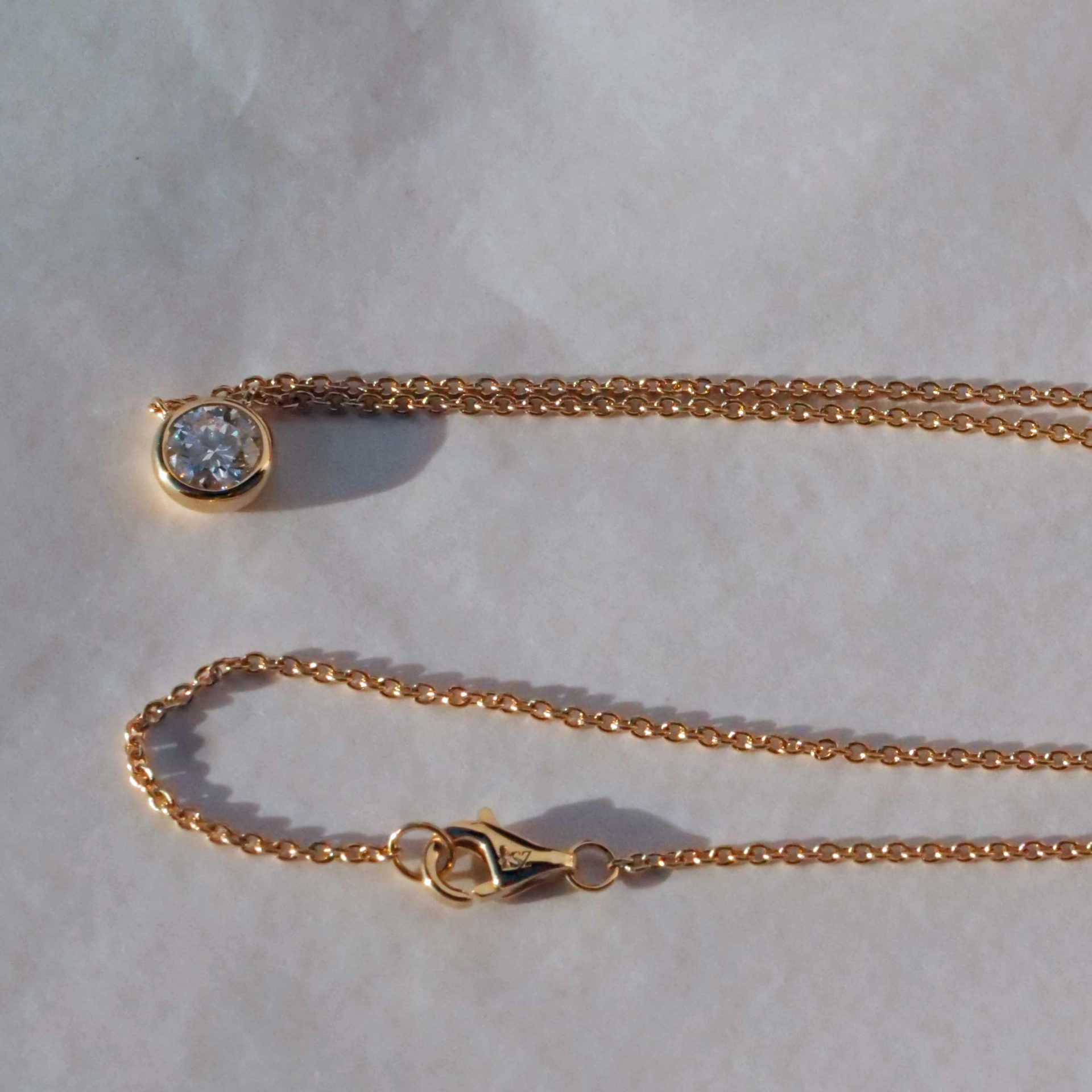 Brilliant Necklace 0.50 ct E (very fine white) / SI1 (small inclusions) with GIA report 18 kt Gold