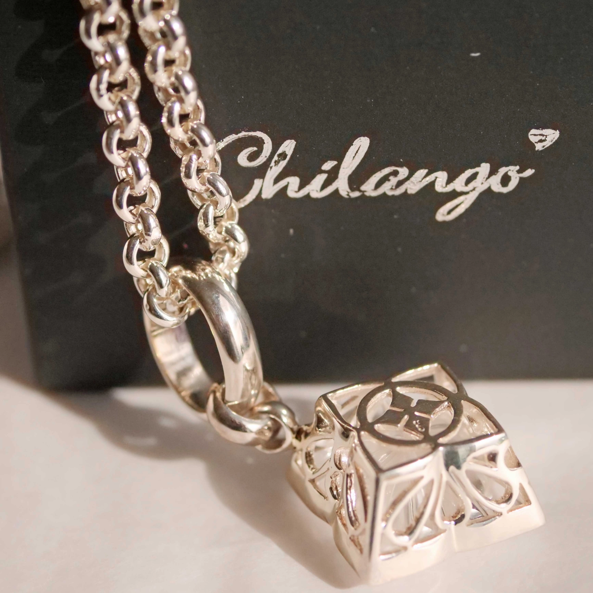 Pendant from Chilango Square Flower Diamond Cut White Quartz