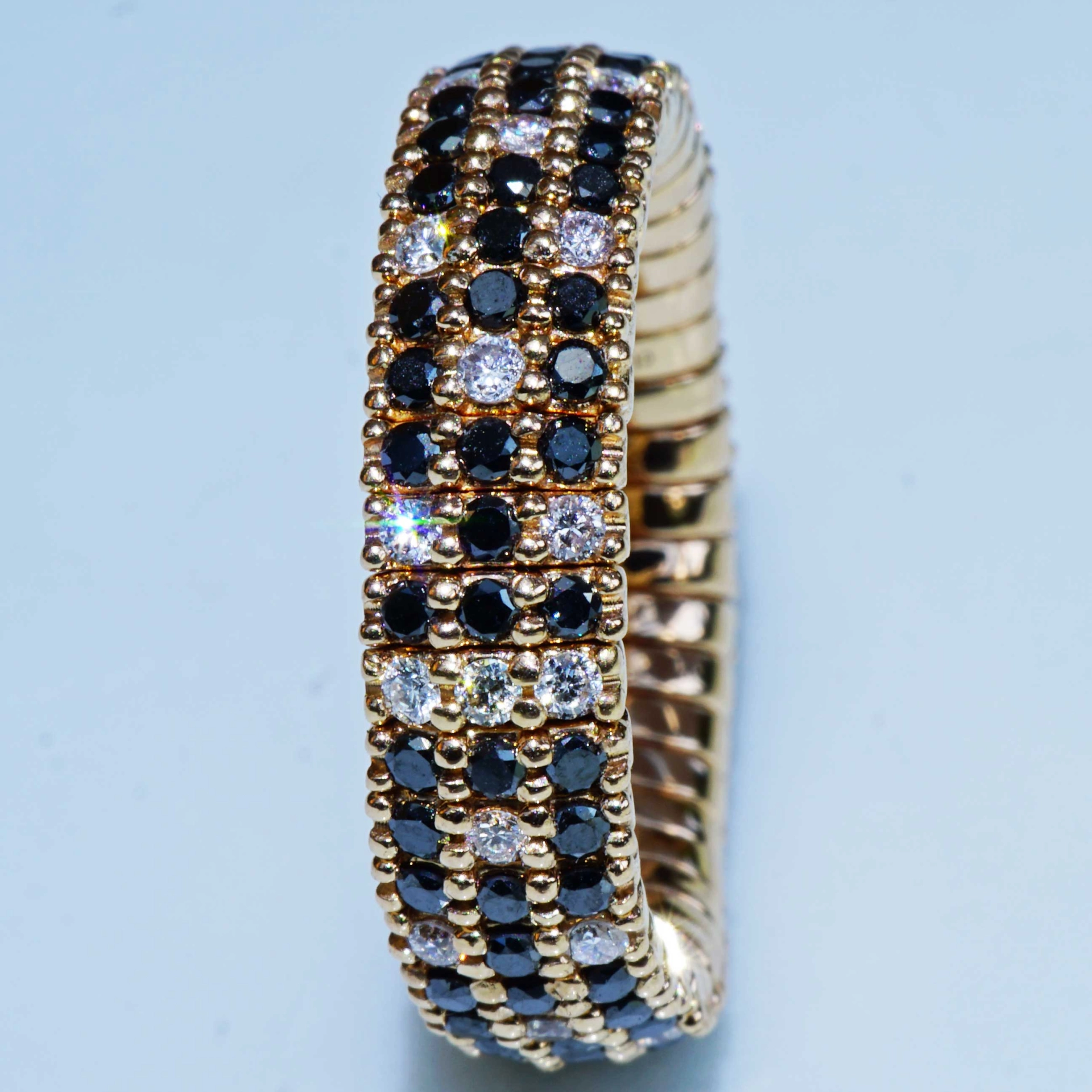 Brilliant Memory Ring Magic flexibel black-white 18 kt Rosegold..ingenious and simple