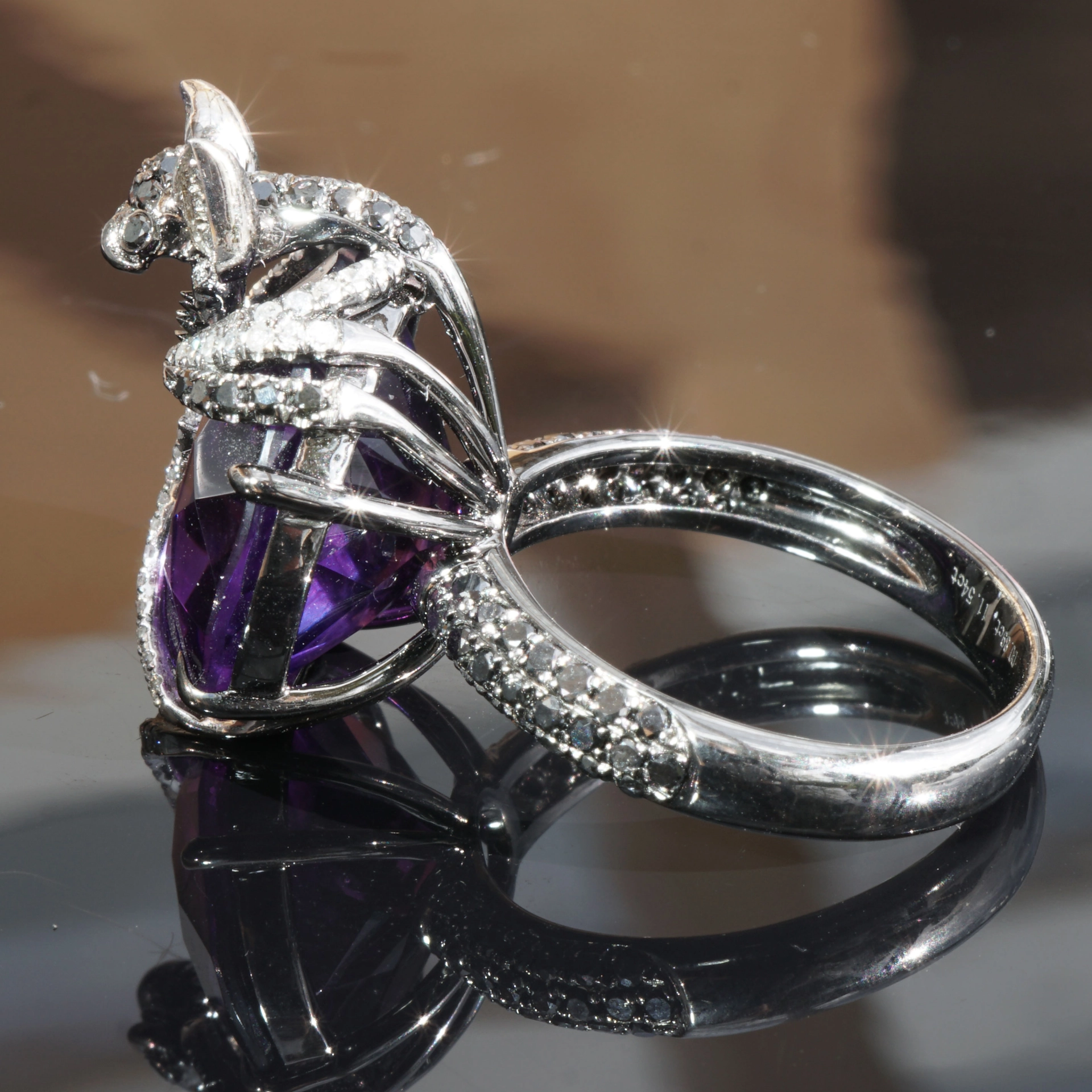 Bat Designer Ring with brasil. Amethyst and Diamonds total ca. 0.89 ct....Creepy