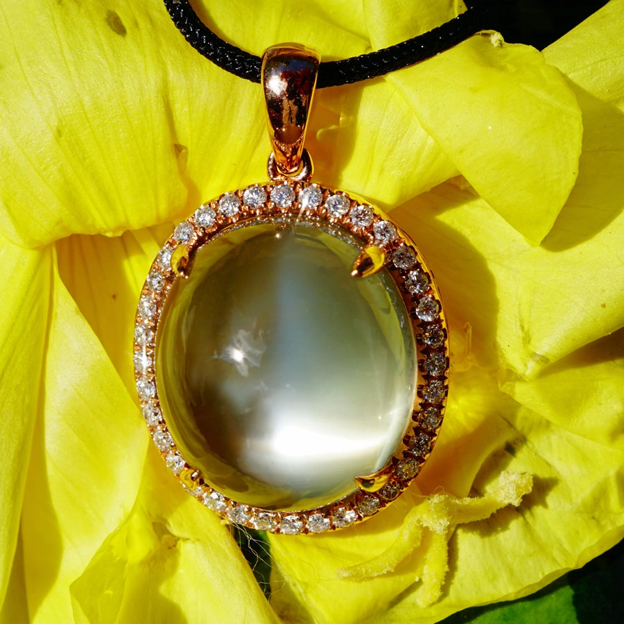 Moonshine...25 ct fine Moonstone with 0.48 ct Diamonds