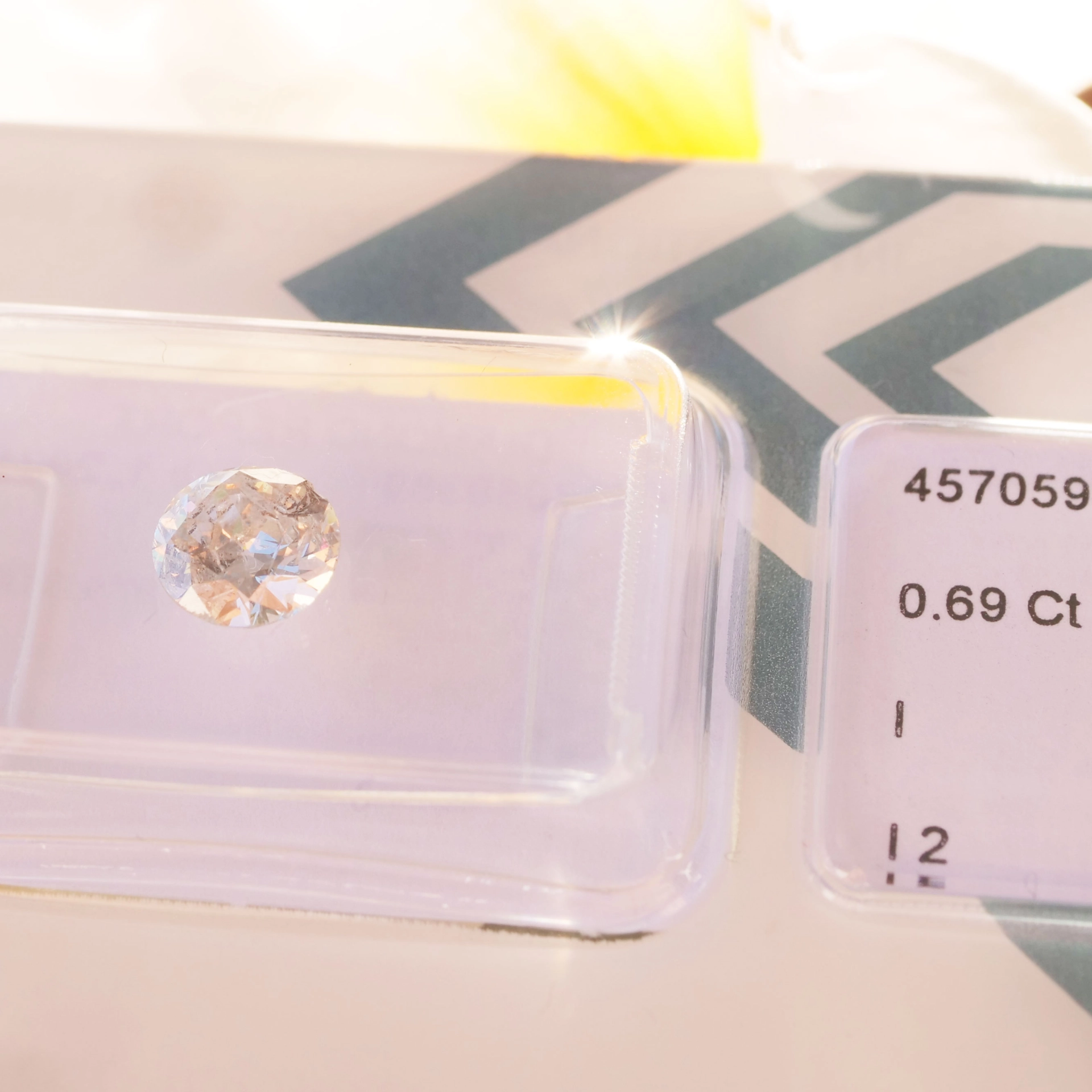 Cool full cut brilliant ideal for framing, 0.22 ct, tinted white (K) / I1  welded by IGI