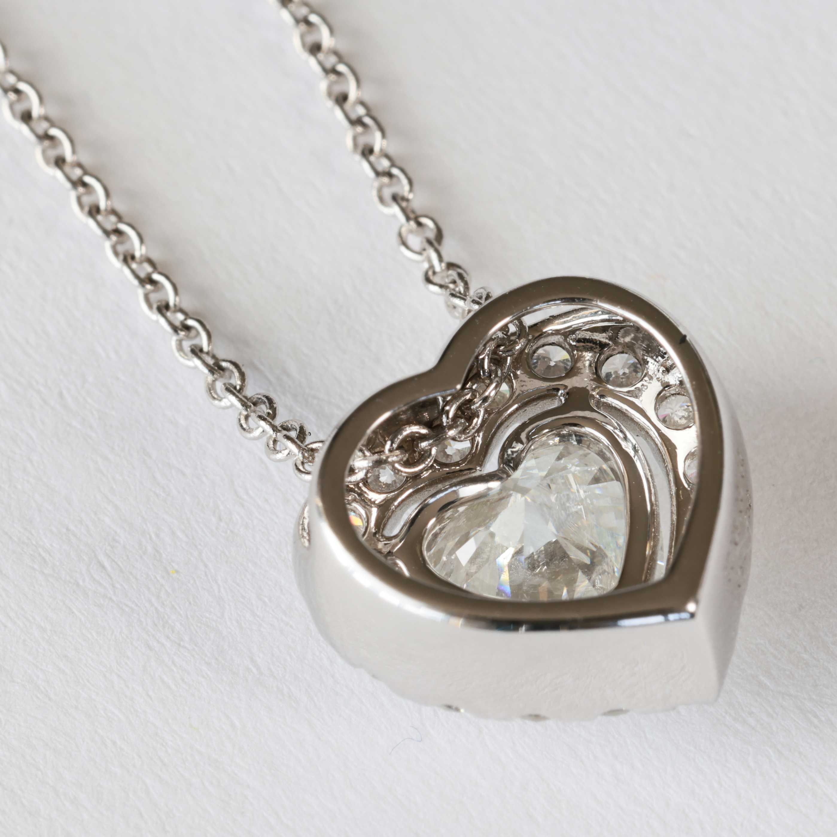 Necklace with Heart full cut brilliant approx. 0.90 ct, H (white) / SI2  GIA report 18 kt White Gold