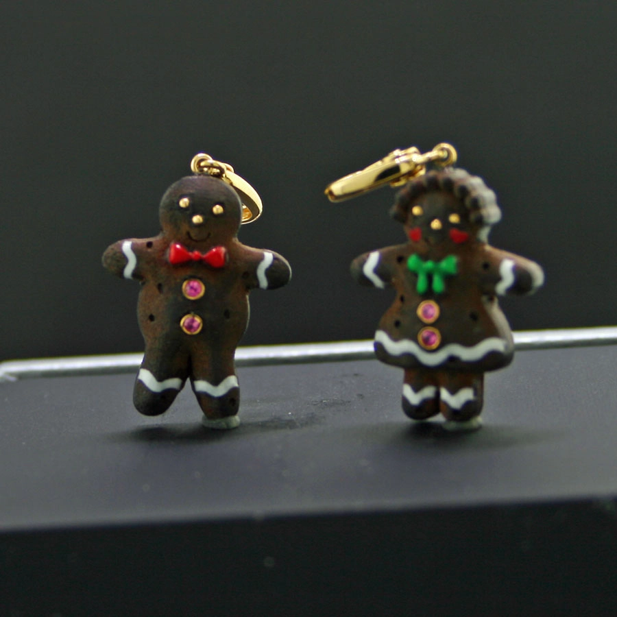 Edelstein-Lebkuchenmann und Lebkuchenfrau, 750-er Gelbgold, 18 kt.,