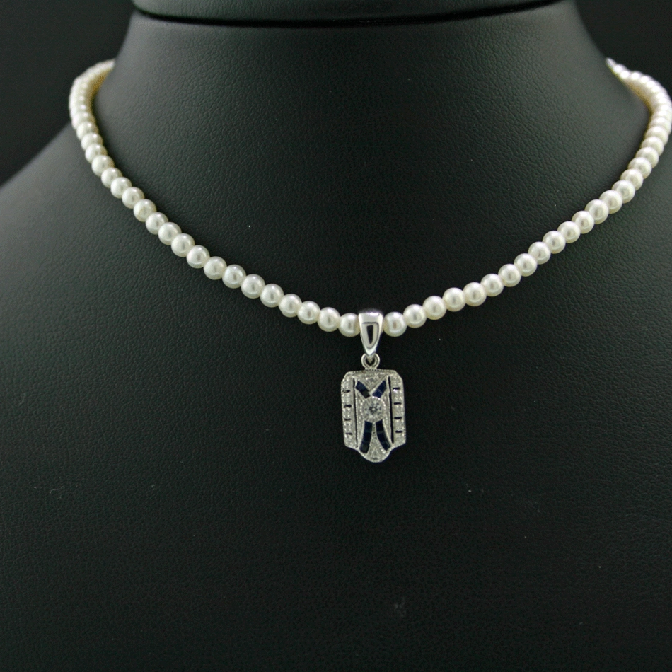 Anhänger mit feinster Akoya-Kette, 375/-WG.