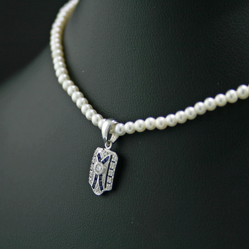 Anhänger mit feinster Akoya-Kette, 375/-WG.